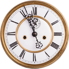 Old antique clock face with roman numeral isolated on white background