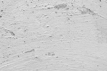 Wall fragment with scratches and cracks