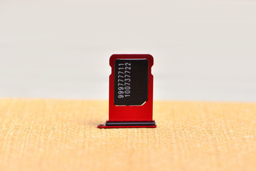 Red mobile phone chip and holder