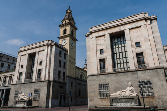 Piazza CLN (acronym of National Liberation Committee ) with two fountains and the San Carlo Borromeo Church