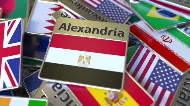 Souvenir magnet or badge with Alexandria text and national flag among different ones. Traveling to Egypt conceptual intro animation