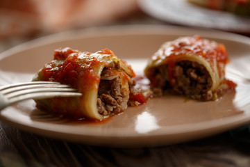 stuffed cabbage rolls with beef in tomato sauce