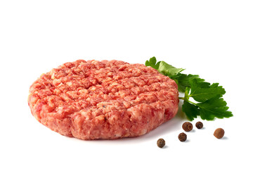 Raw beef patty with spices on white background