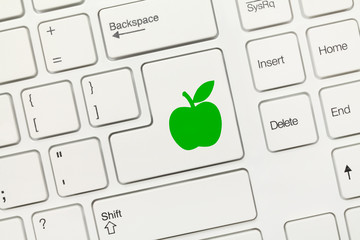 White conceptual keyboard - Key with green apple symbol