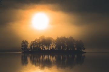 Small island and sunrise light