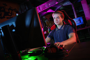 Cyber sport. Team play. Professional cybersport player training or playing online game on his PC