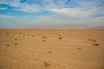 desert smooth sand valley idyllic scenery landscape with background horizontal board between ground and sky, peaceful silent atmosphere and empty copy space for text  