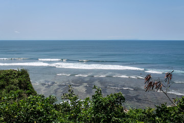 ULUWATU, BALI, INDONESIA - November 30, 2013: Scenic View of the Surf in Uluwatu, Bali from the cliffs.