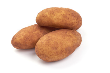 Young washed unpeeled potatoes, close-up, isolated on white background