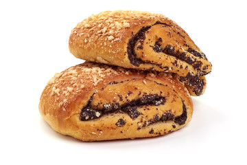Homemade roll with poppy seeds, close-up, isolated on white background