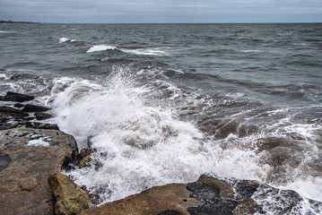 waves of the Atlantic Ocean crashing against the rocks