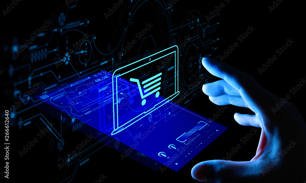 Poster Hand pushing virtual symbol of online shopping with modern UI computer and smart phone.