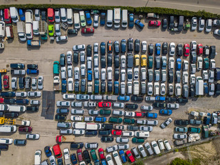 Obraz premium Aerial view of large car parking of car dealer. Secondhand cars.