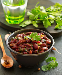 Stewed red beans with spices and cilantro, hot pepper. Lobio. Chile con carne.