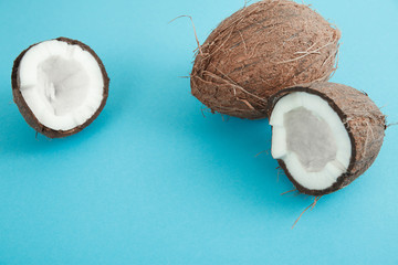 Fresh coconut on blue background