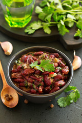 Stewed red beans with spices and cilantro, hot pepper. Lobio. Chile con carne.