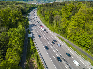 Aerial view of motorway through forest in Switzerland