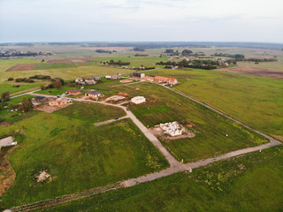 Obraz premium Aerial view of new district under construction in Varluva, Kaunas suburbs, Lithuania