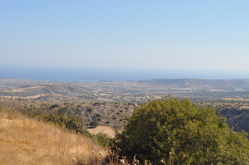 The beautiful natural mountain landscape in the Cyprus massif in the background at sunset