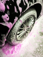 Pink foam in car wash