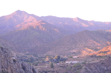 Fototapeta premium The beautiful natural mountain landscape in the Cyprus massif in the background at sunset