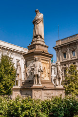 Monument to Leonardo da Vinci with four disciples in Piazza della Scala, Milan