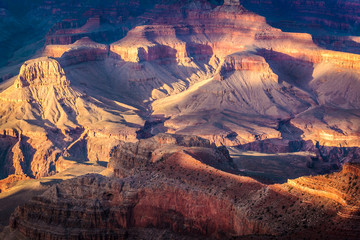 Grand canyon with play of light and shadows on the terrain