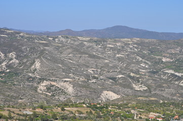 Obraz premium The beautiful natural mountain landscape in the Cyprus massif in the background at sunset