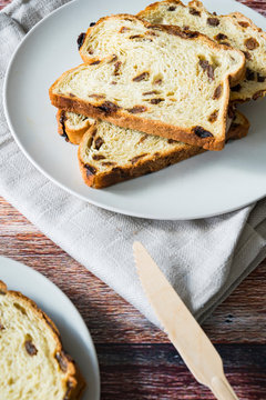 fruit bread with raisins on white plate, Dutch krentenbrood