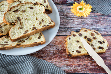 fruit bread with raisins on white plate, Dutch krentenbrood.
