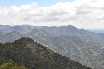 The beautiful natural mountain landscape in the Cyprus massif in the background at sunset