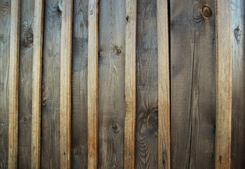 The texture of the wooden wall with slats on the old church
