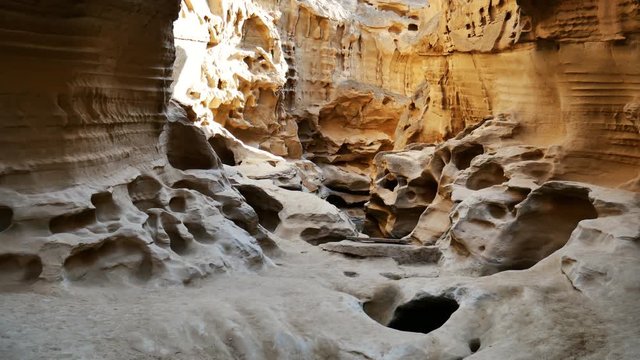 A moving forward shot of an Asian wonderful canyon A moving forward shot of strange canyon under direct natural sunlight no people