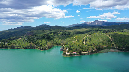 Obraz na płótnie Canvas Aerial drone panoramic view of famous dam and lake of Marathon with beautiful clouds, North Attica, Greece