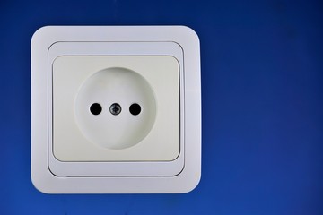 Electrical power socket for connecting electrical appliances, mounted on the wall. The socket has socket contacts - connector for connection and disconnection of electrical circuits of the equipment.