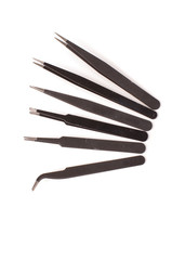 Set of antistatic tweezers isolated on the white background