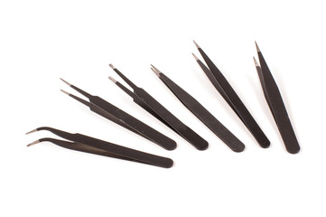 Set of antistatic tweezers isolated on the white background