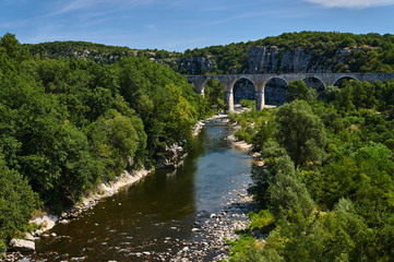 Fototapeta na wymiar Stone, Railway viaduct over the River Ardeche in France.