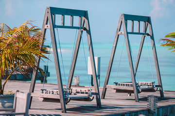 Fototapeta premium Summer empty outdoor cafe at exotic island on the seashore
