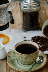 cup of coffee on wooden table