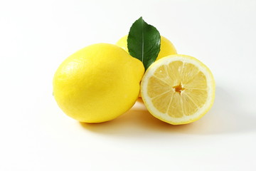 fresh lemon lime citrus fruit in white background