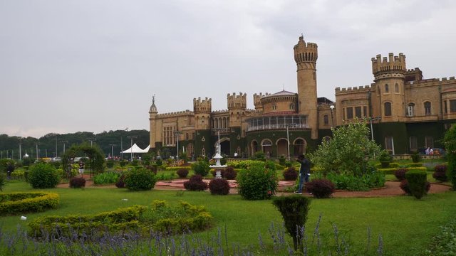 day time famous bangalore city palace front garden slow motion panorama 4k india