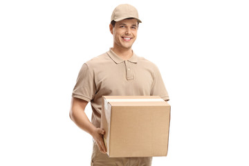 Smiling delivery guy holding a package