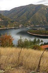 Obraz premium Sunset ladscape of Vacha (Antonivanovtsi) Reservoir, Rhodope Mountains, Plovdiv Region, Bulgaria