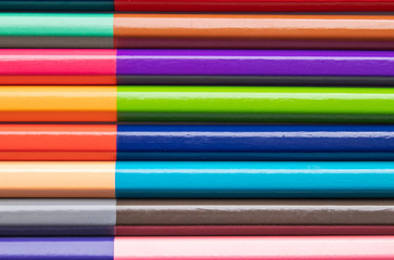Background of colored wood pencils for children's creativity. close-up.
