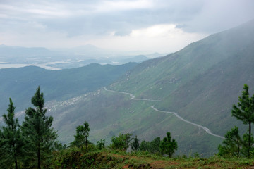 The Hai Van Pass, Da Nang, Vietnam. A beautiful road to drive by motorbike, very nice curves, turns and awesome view. Aerial view.