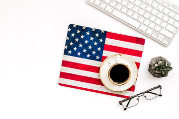 Obraz premium Memoral day of United States of America with flag, keyboard, glasses and coffee on white background top view