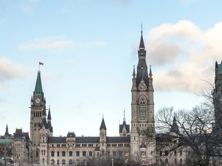 Obraz na płótnie Canvas Main clock tower of the center block of the Parliament of Canada, in the Canadian Parliamentary complex of Ottawa, Ontario. It is a major kandmark, containing the Senate and the house of commons