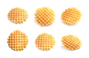 Set of delicious waffles on white background