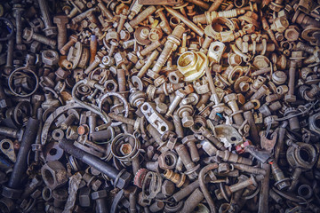 Detail of different metallic many bolts and nuts